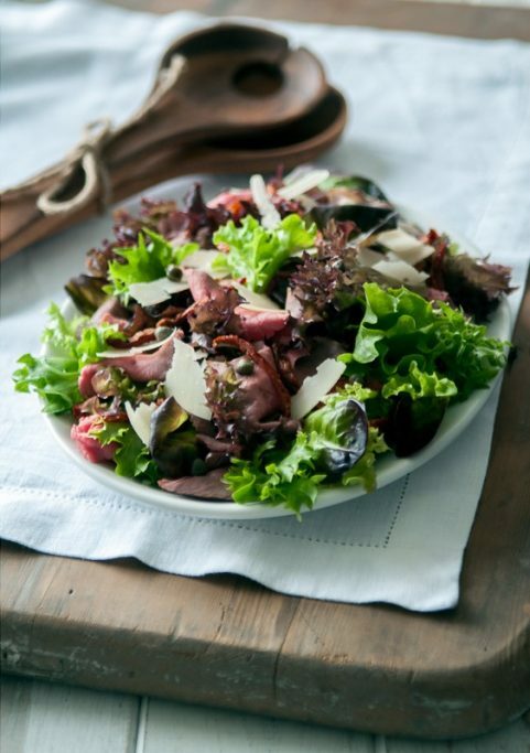 Food photography Example - styled salad leaves on a napkin and wooden table