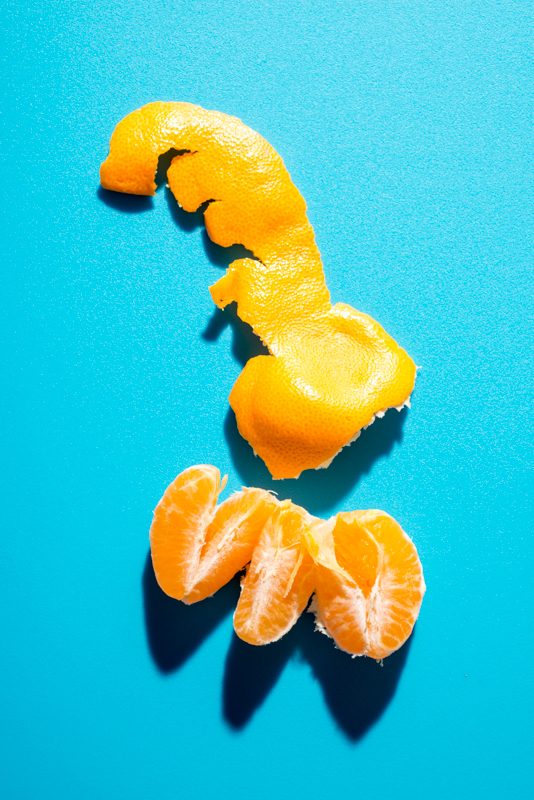 Satsuma or tangerine orange peel and segments