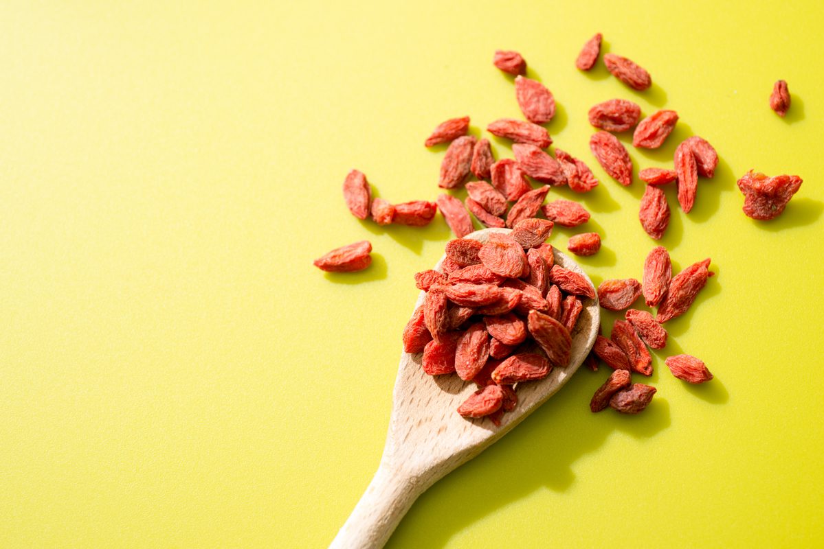 Goji berries on a wooden spoon